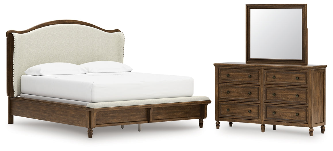 Sturlayne California King Upholstered Panel Bed with Mirrored Dresser